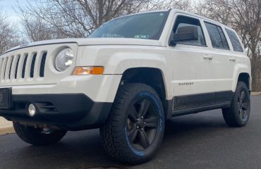 Lifted Jeep Patriot with Rough Country lift kit with N3 struts