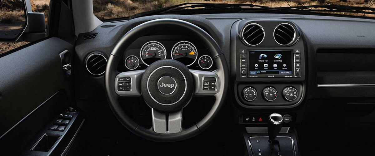 Jeep Patriot interior with steering wheel and automatic gearbox shifter